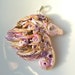 Pale pink horse head pendant with gold detailing handmade from polymer clay