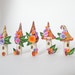 Fairy house village miniature in pink, orange, purple and gold colours handmade from polymer clay