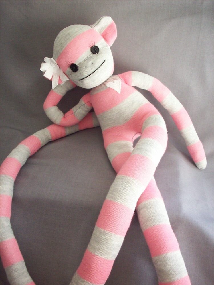 pink striped sock monkey