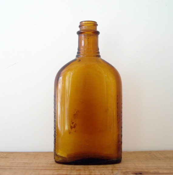 Items similar to Vintage Burnett's Slender Brown Glass Bottle in ...