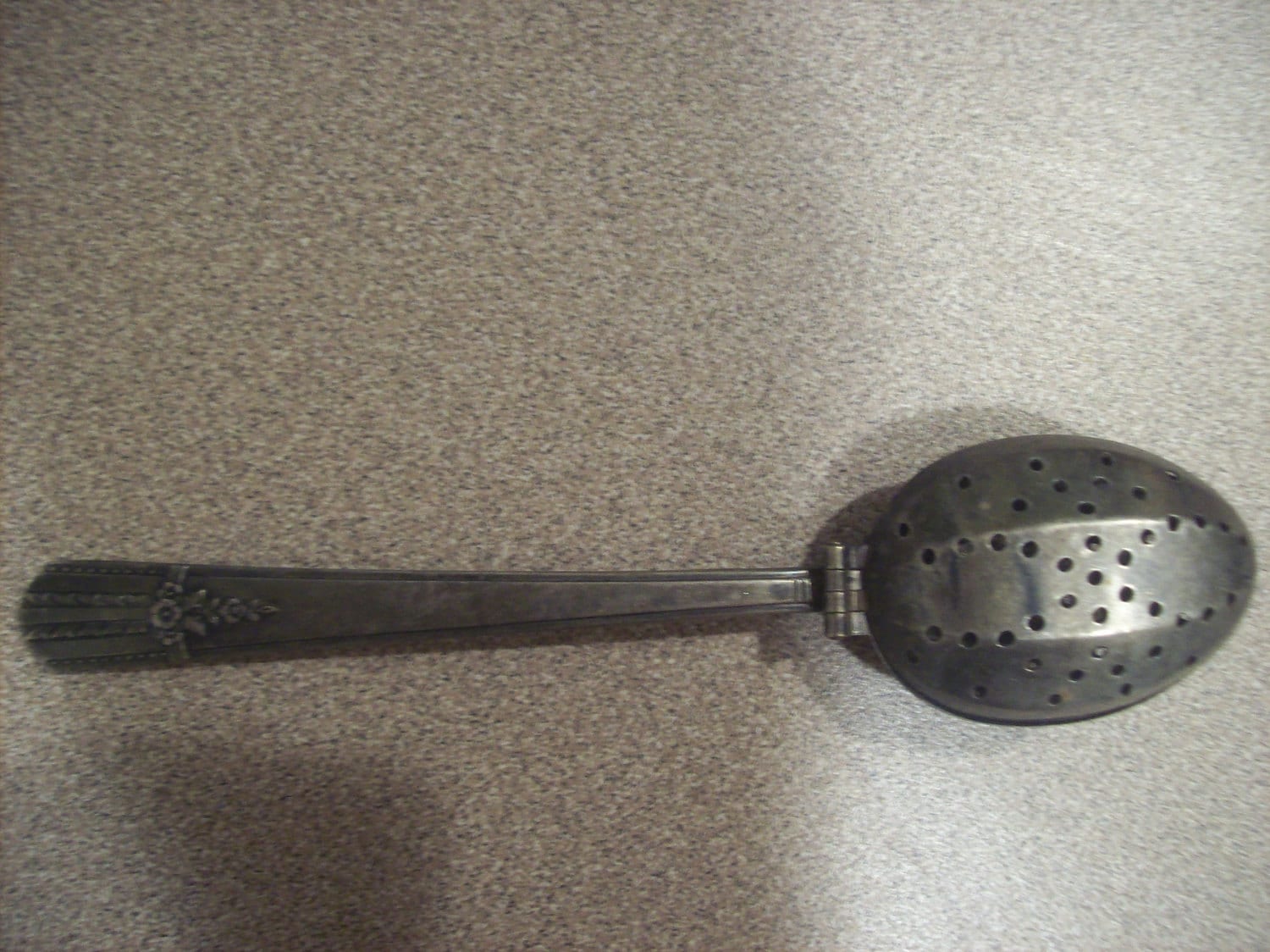 Antique tea strainer spoon