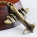 Antique Brass Airplane Necklace - Discover