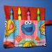 Sesame Street Friends Mini Crayon Keeper Roll Up Holder 4-Count Party Favor