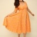 Vintage 1950s orange lace full circle dress
