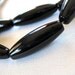 ONLY 2 AVAILABLE Glossy Black Onyx Tapered Tube Beads, 30mm x 10mm, full strand