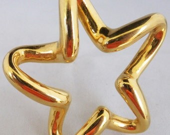 Vintage jewelry brooch in gold tone huge star motif 80s gay brooch