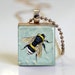 Honey Bee Necklace Bumblebee on Blue Floral Background Scrabble Tile Pendant - Ball Chain Necklace Included (ITEM S725)