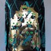 Golden kitty sweater with neon green eyes