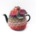 Autumn Tea Pot Cosy hand knitted in chunky colourful twist yarn tie closure with 3 knitted leaves