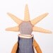 Pale beige Natural wool funky handmade Modern rag doll With cool Haircut Wearing Natural earth tones, peach and Blue