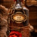 SALE Hearts Desire Love Potion Vintage Bottle Steampunk Style Embellished with Chains and Charms Witchcraft Decoration OOAK