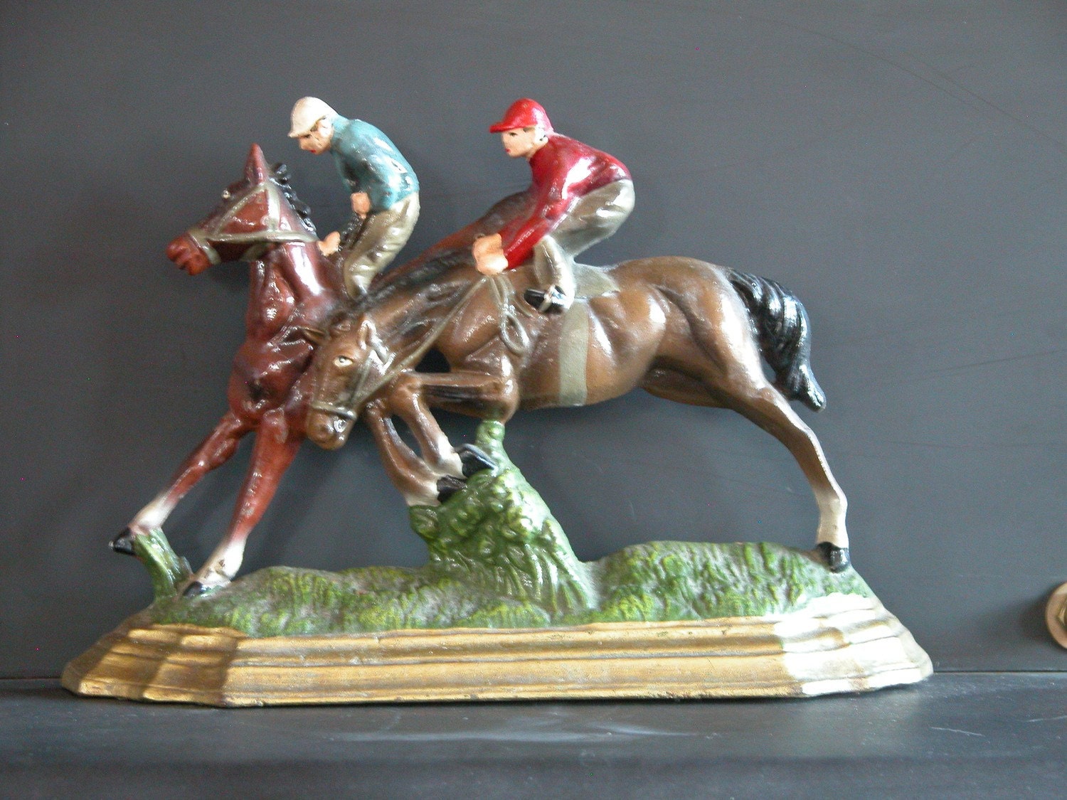Vintage Cast Iron Jockey and Horse Doorstop
