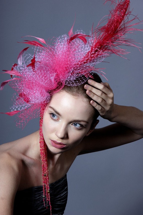 Items similar to Flirty, feathery and flaunty hot pink fascinator on Etsy