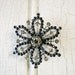 Vintage Clear and Black Rhinestone Brooch - Flower or Snowflake