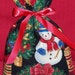 Christmas Decorations on Black Small Fabric Gift Bag - Holiday, Snowman, Stockings, Trees, Wreaths, Red, Green, Blue