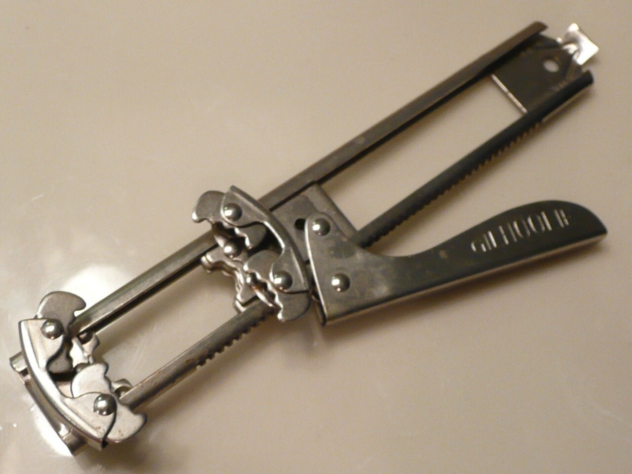 1953 Gilhoolie Adjustable Bottle and Jar Opener