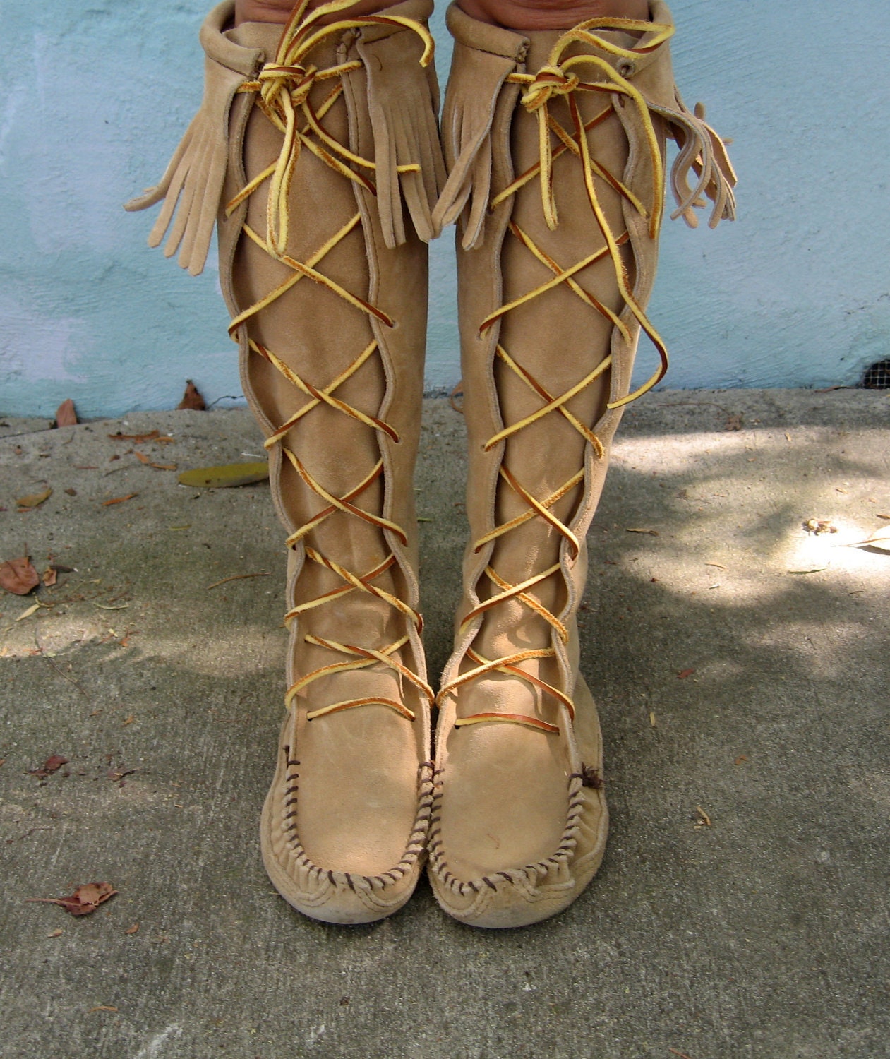 knee high lace up moccasin boots