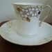 Antique Nippon Gold and White Demitasse Cup and Saucer