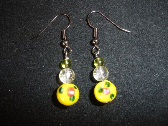 Items similar to Beaded Yellow Dangle Earrings on Etsy