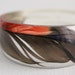 Asymmetrical eco resin bangle with black red green and blue Amazon parrot feather transparent bangle bracelet
