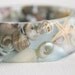 seashell swirl eco resin bangle with shells and starfish in transparent blue
