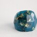 Deep aqua soft faceted eco resin ring with suspended gold leaf