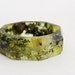 woodland lichen eco resin bracelet with octagonal facets contains real moss, lichen and twigs
