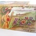 Postcard, with beautiful woman, paddle and canoe, pansies or violas, spring flowers, summer lake, antique Edwardian embossed card