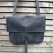 Waxed leather pouch/messenger bag/satchel in black with leather strap COLLECTION UNISEX