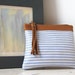 Leather zipper pouch/ bag organizer / cosmetic bag in lavender blue and white stripes with tan finishing