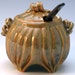 Carved porcelain jam or mustard jar with lid in gold and black