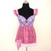 vintage inspired bustier top with ruffles of lace and vintage motifs......