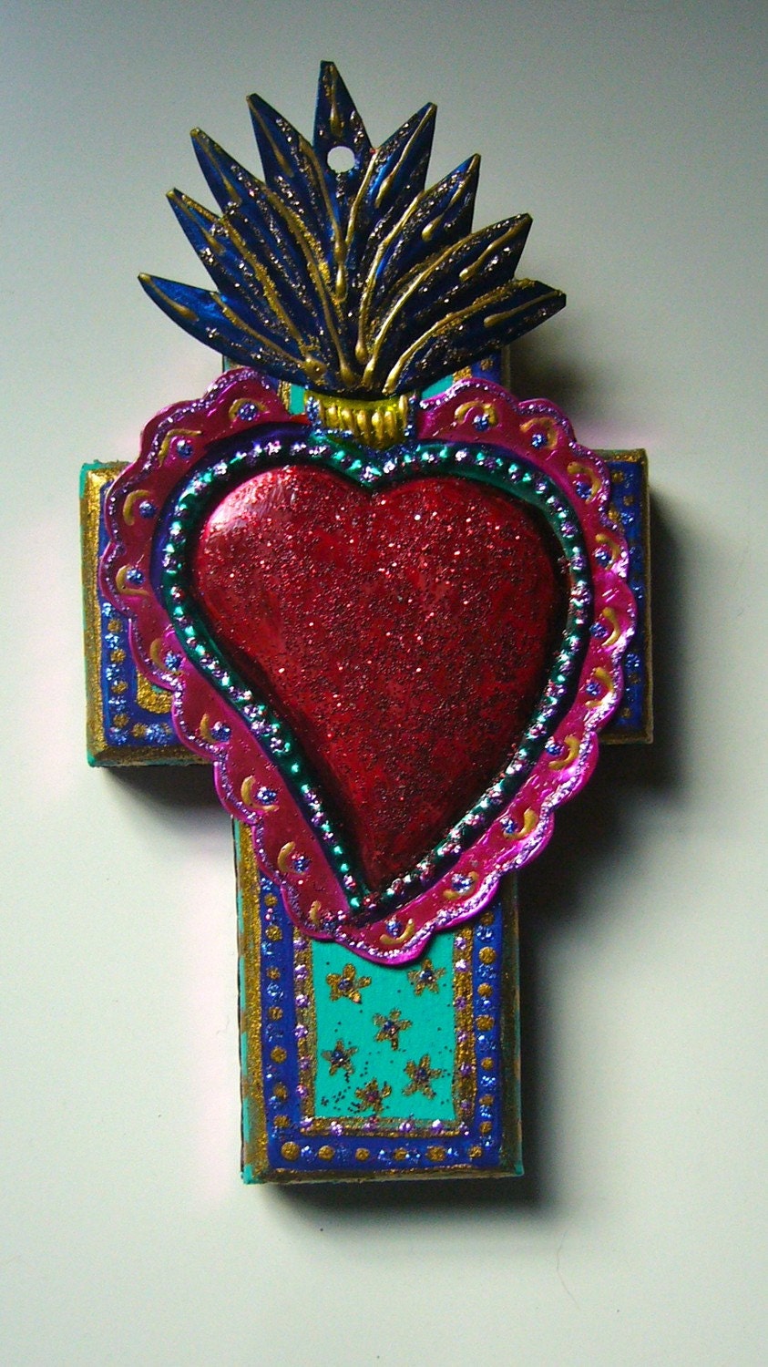 Mexican tin sacred heart on wooden cross
