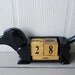 Black Doxie Perpetual Calendar, Item retired.