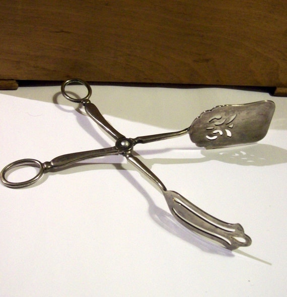 Vintage ornate silver plated salad tongs