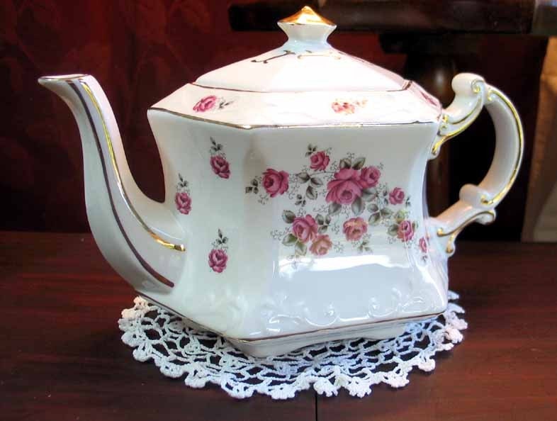 Teapots Bone China and Fine Porcelain Teapots many with matching