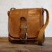 Upside - Vintage 70s Leather Bag with Bold Brass Strap Closure