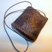 Braided leather purse