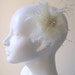 Bridal feather fascinator/hair comb in pale ivory with jewel crystal. FEATHER/PEARL SPRAY.