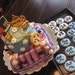 A dozen Eat Me Cookies for your Alice in Wonderland Themed Party