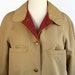 1970s Bonnie Cashin Tan Raincoat with Red Plaid Lining Coat. Small to Medium