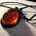 STORE CLOSING SALE - Black Bat Setting With a Massive Red Cameo on an 18in Velvet Cord