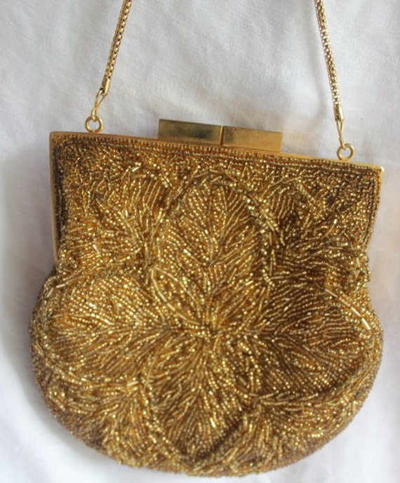 la regale gold clutch