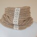 Neck warmer cream with lace detail