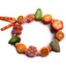 Girls Stretch Bracelet, children jewelry, multicolored polymer clay, Medium, orange green, child