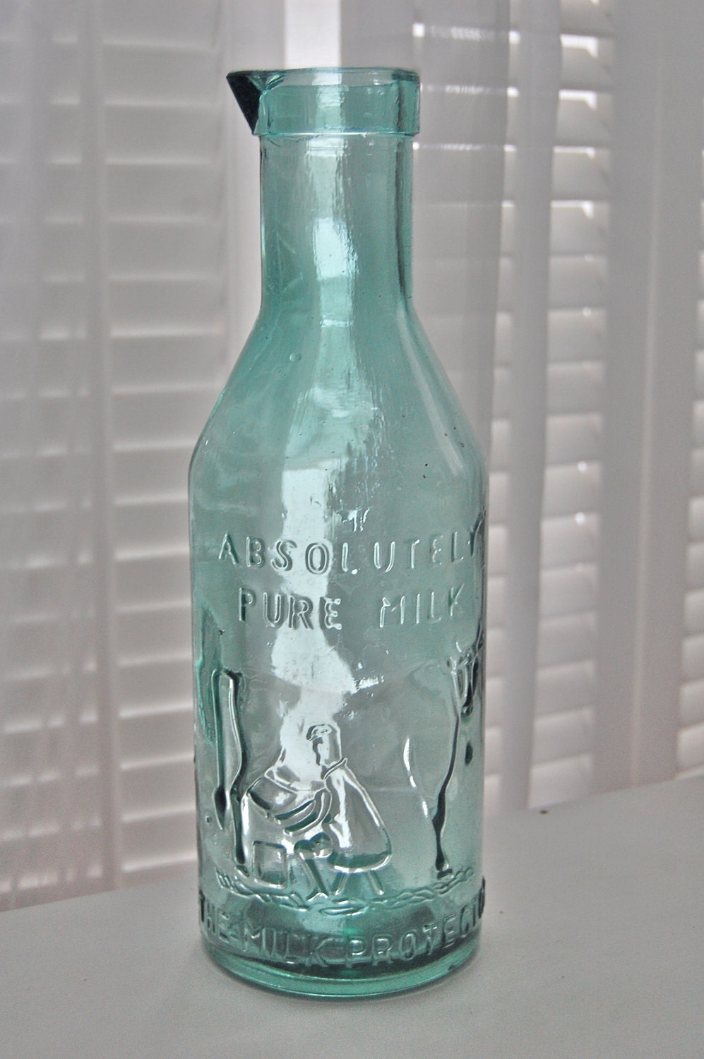 Vintage milk bottle Absolutely Pure The Milk