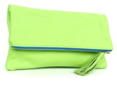 Items similar to Neon Green Fold Over Clutch w/ Cobalt Blue Zipper on Etsy