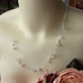 Wedding necklace, tiny white Lucite flowers, silver balls and chain