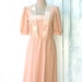 Vintage NUDE LACE Fancy Dress....size medium .....60s dress. 50s dress. nude. lace. cream. sheer. mid century