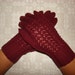 Hand knitted warm soft women gloves
